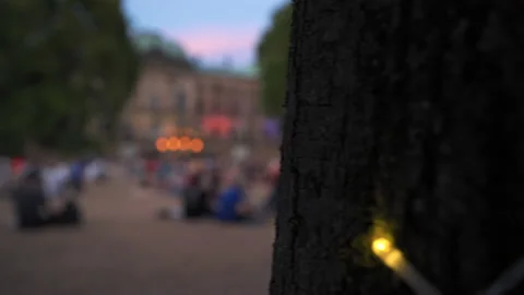 Seating area at a park event in Dresden with live music and fröhloi viewers Stock Footage 204101712
