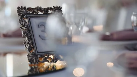 Seating for guests, plates with numbers on the tables. Stock Footage 113225676