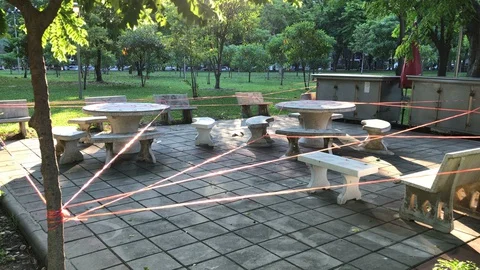 Seats and Picnic Table Blocked at Bangkok Park Because of Coronavirus Pandemic Stock Footage 130095733