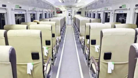 Seats in an economy class train cabin. Transportation. Travel. Stock Footage 340719952