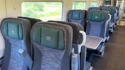 Seats in the first-class carriage of a Great Western railway high speed train Stock Footage 337318030