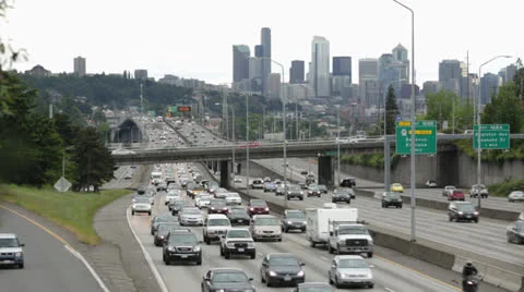 Seattle Freeway commuter traffic time-lapse city skyline Stock Footage 24544806