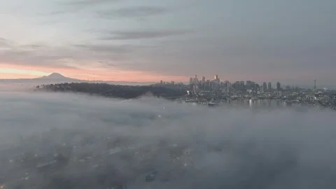 Seattle Skyline and Mount Rainier Above Fog Sunrise Aerial 4K Stock Footage 250026825
