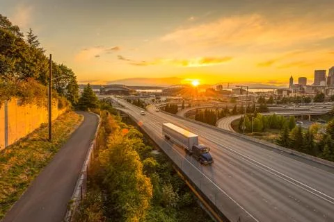 Seattle skylines and Interstate freeways converge with Elliott Bay and the wa Stock Photos