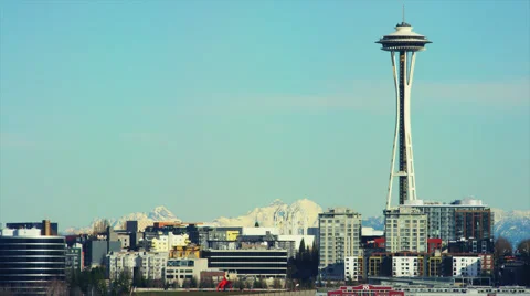 Seattle Space Needle framed right with mountains. Stock Footage 62842107