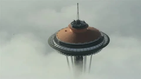 Seattle Space Needle Through the Fog - Aerial Circling View Stock Footage 12569074