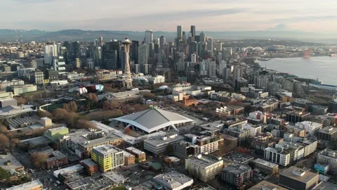 Seattle Sunset: Aerial View of Space Needle, Climate Pledge Arena, Mt. Rainier Stock Footage 287373718