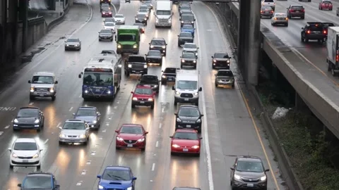 Seattle Traffic During Rainy Rush Hour with Close Call Stock Footage 154522786