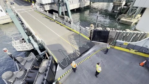 Seattle, USA (WA) - 2026/04/30: Loading Ramp Rises and Safety Nets Set Aft Stock Footage 334155845