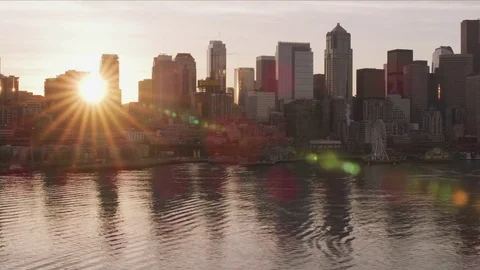 Seattle, Washington circa-2017, Sun peeks out from behind downtown Seattle Stock Footage 84320116