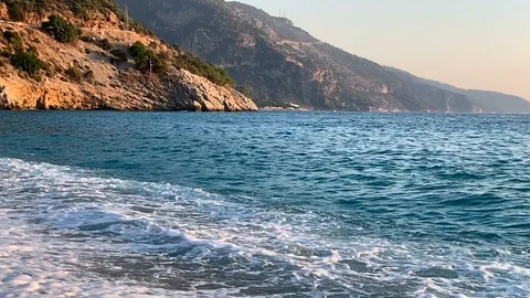 Seaview with mountains in slow motion Stock Footage 122584087