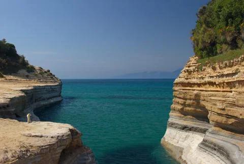 Seaview with sandstone cliffs Stock Photos