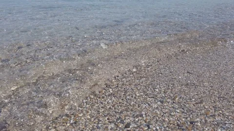 Seaweed and Waves and small boat in the background Stock Footage 122084648