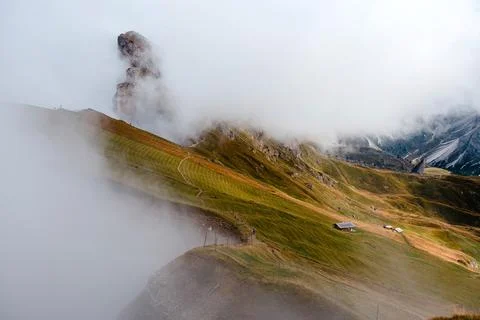 Seceda mountain landscape in the Dolomites with dramatic clouds and green s.. Stock Photos
