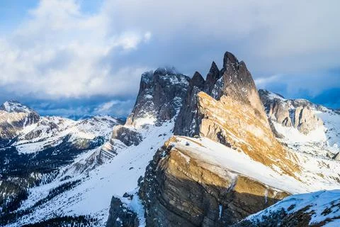 Seceda peak between clouds and snow in winter, Dolomites Alps, Italy Stock-Fotos
