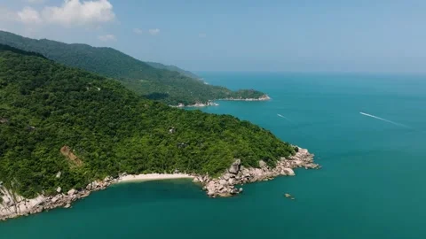 Secluded bay surrounded by lush green hills. Head khontee. Ko Pha Ngan, Thailand Stock Footage 297448075