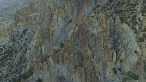 Secluded Braga monastery nesting near sharp rocky cliffs, gloomy highland, Nepal Stock Footage 124682455