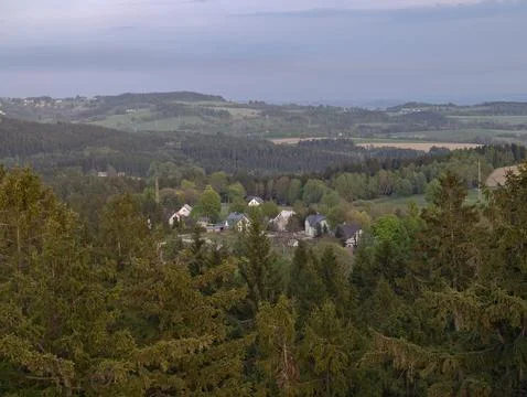 Secluded high elevation village showcasing picturesque landscape of evergre.. Stock Photos