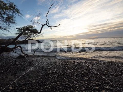 Secluded Maui Rocky Beach Cove Sunset Stock Photos