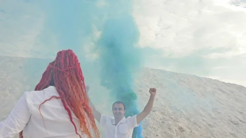 Secluded romantic date against the backdrop of white sand and a sky with white Stock Footage 136284980