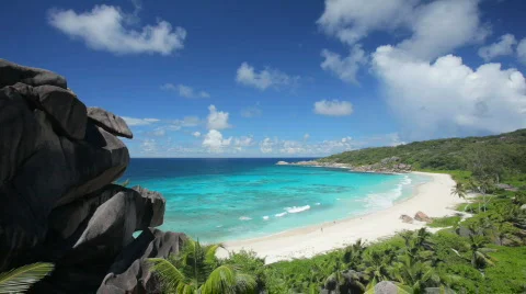 Secluded tropical beach with rocks Stock Footage