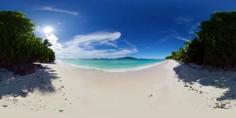 Secluded white sand beach with turquoise waters. La Digue, Seychelles. Stock Footage 301789429