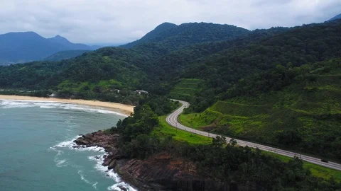 Secnic Aerial View of A Road in Between the Ocean and the Hills Vidéo 125826508