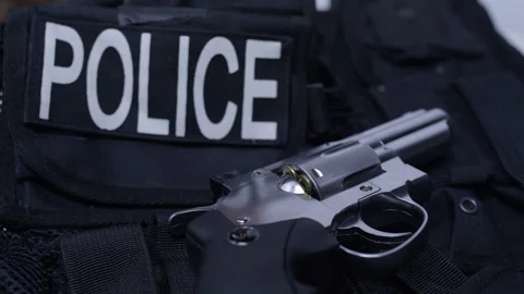 Second Amendment - Police vest and weapon static view Stock Footage 301090261