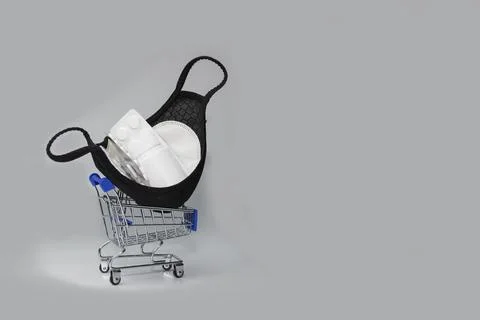 Second and third waves of coronavirus. Medical mask, disposable gloves Stock Photos