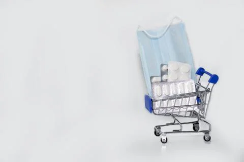 Second and third waves of coronavirus. Medical mask, disposable gloves Stock Photos