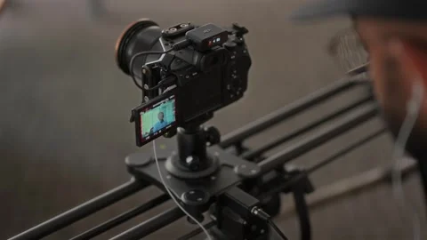 Second Camera on Slider During Commercial Video Production Stock Footage 325324433