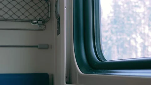 The second-class cabin of a passenger train without passengers. From the lower Stock Footage 149900859