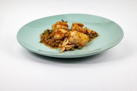 Second course with cuttlefish and tomato peas Foto stock
