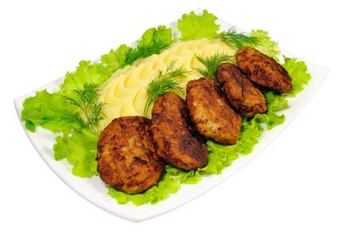 The second dish - Russian rissole served with mashed potatoes with herbs Stock Photos