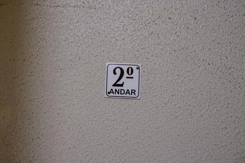 Second floor sing in staircase Stock Photos