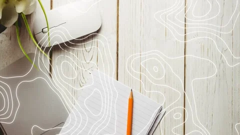 On second frame contour lines expanding and sweeping over notepad and pencil, Stock Footage 330258394