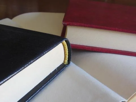 Second hand books with blank pages on a wooden table Stock Photos