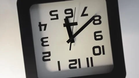 Second hand of a classic wall clock is synchronized with rotation of the Stock Footage 322107684