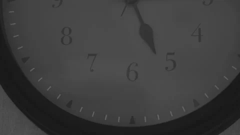 Second hand on clock hanging on wall runs at fast pace Stock Footage 240981307