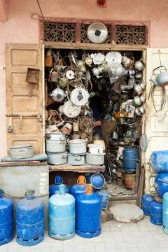 Second hand dealer selling items at Marrakesh shop in Morocco Stock Photos