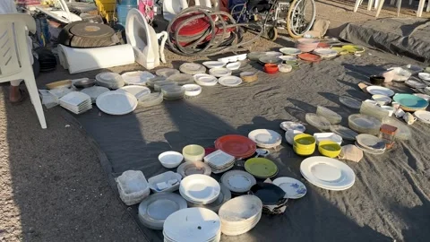 Second-Hand Goods at a Street Flea Market Stock Footage 346880578
