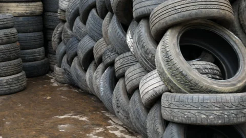 Second hand tyres stacked up for sale. Stock Footage