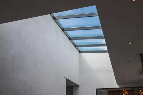 The second light in modern interior, a window on the ceiling with a blue sky Stock Photos