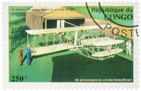 Second model biplane Wright brothers on postage stamp Stock Photos