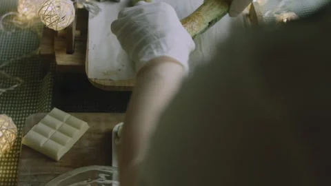 Second pastry layer positioned over the creamy foundation Stock Footage 342129280