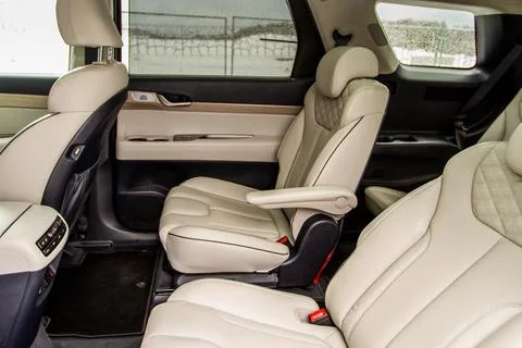 Second row captains chairs of the modern SUV car inside. Leather back passeng Foto stock