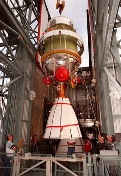 The second stage of a Boeing Delta II rocket arrives at the top of the tow... Stock Photos