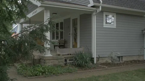 Second Story Window of Gray House Video stock 100899536