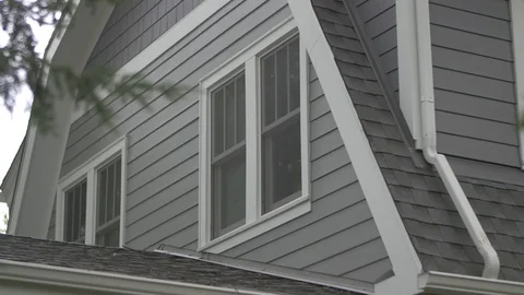 Second Story Windows of Gray House Stock-Footage 100899549