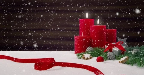 Second Sunday of Advent - Beautiful snowfall in front of a Christmas decoration Vidéo 82340458